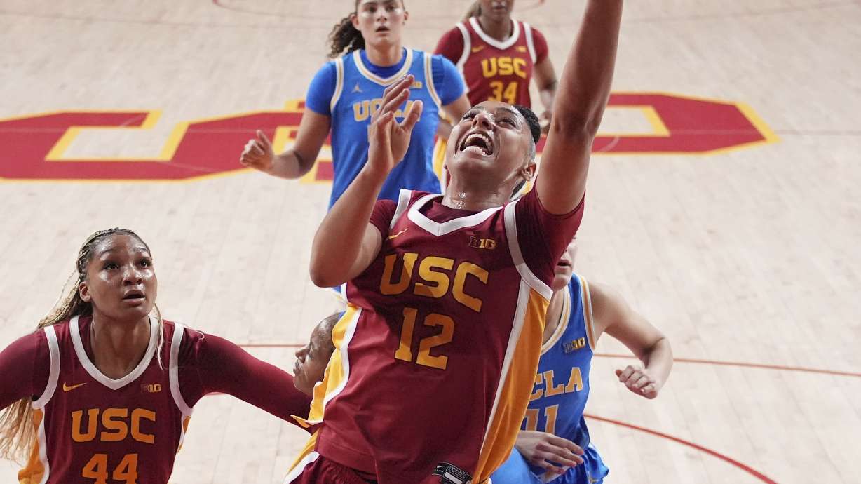 Southern California guard JuJu Watkins (12) shoots during the first half of an NCAA college basketball game against UCLA, Thursday, Feb. 13, 2025, in Los Angeles.