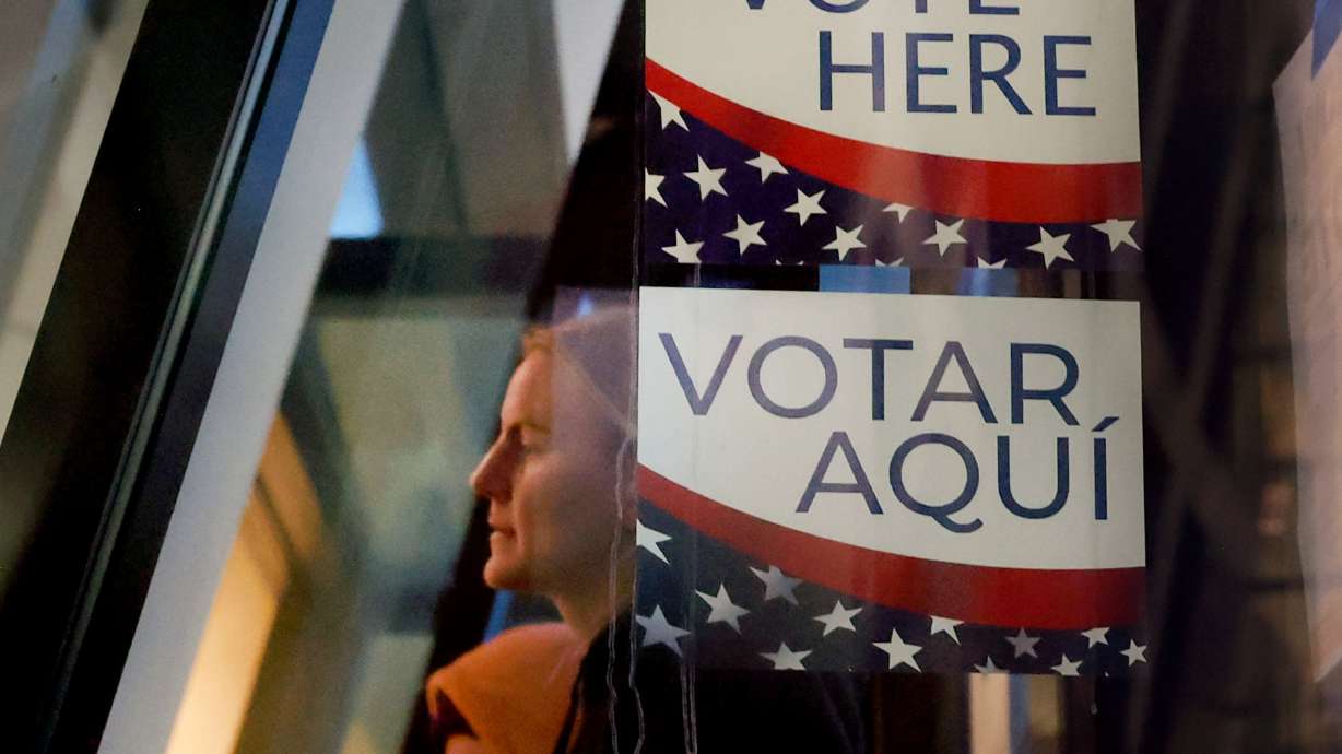 People wait to vote at the Salt Lake City Library on Nov. 5, 2024. The Utah House voted along party lines on Friday to remove the state from the ERIC voter roll maintenance system after a debate over whether there was an adequate alternative in place.