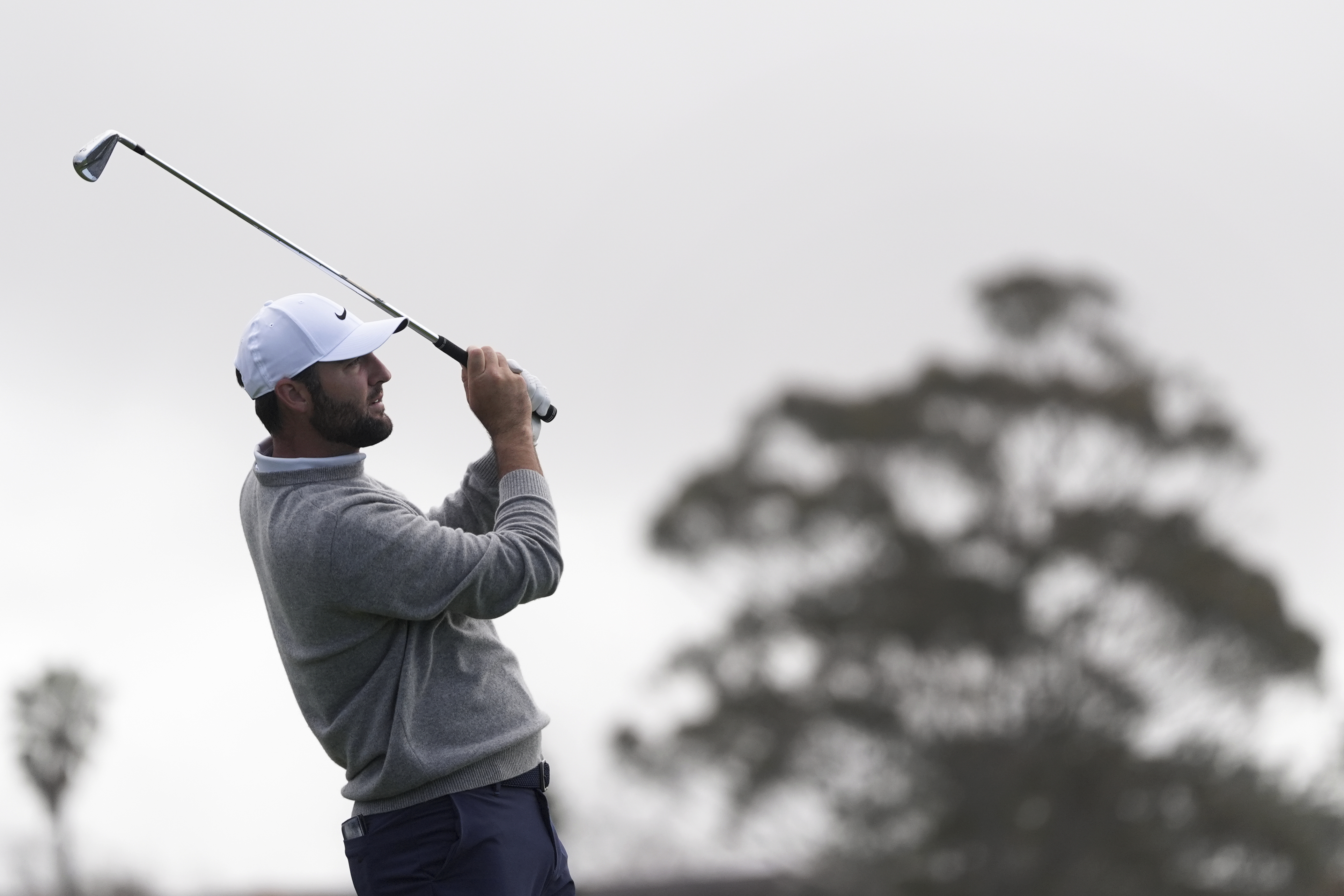 Scottie Scheffler hits a tee shot on the 16th hole of the South Course at Torrey Pines during the second round of the Genesis Invitational golf tournament Friday, Feb. 14, 2025, in San Diego.