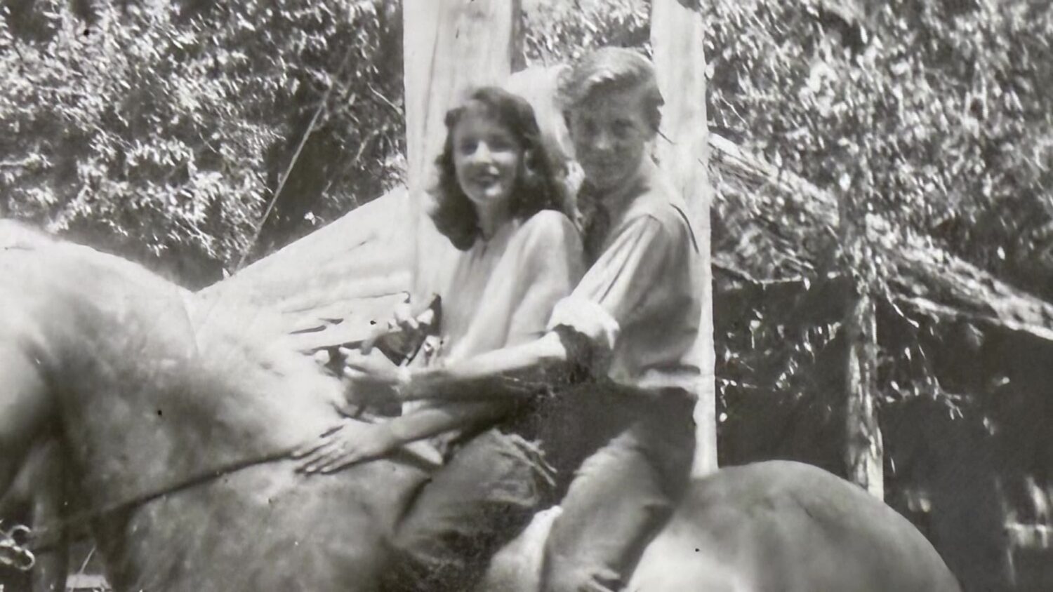 The couple riding a horse during their early years.