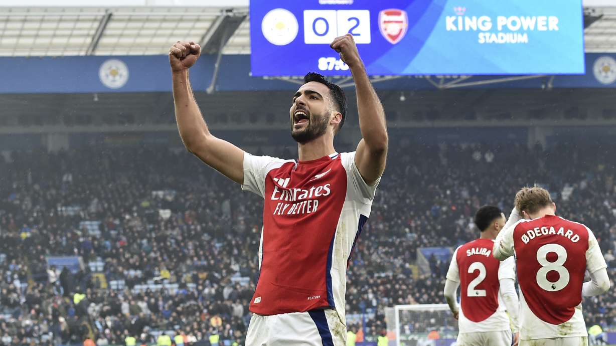 Arsenal's Mikel Merino celebrates after scoring his side's second goal during the English Premier League soccer match between Leicester City and Arsenal at King Power stadium in Leicester, England, Saturday, Feb. 15, 2025.
