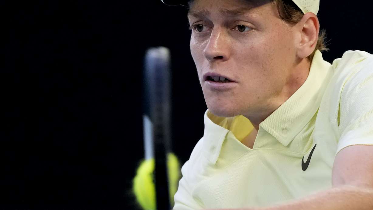FILE -Jannik Sinner of Italy plays a backhand return to Alexander Zverev of Germany during the men's singles final at the Australian Open tennis championship in Melbourne, Australia, Jan. 26, 2025.