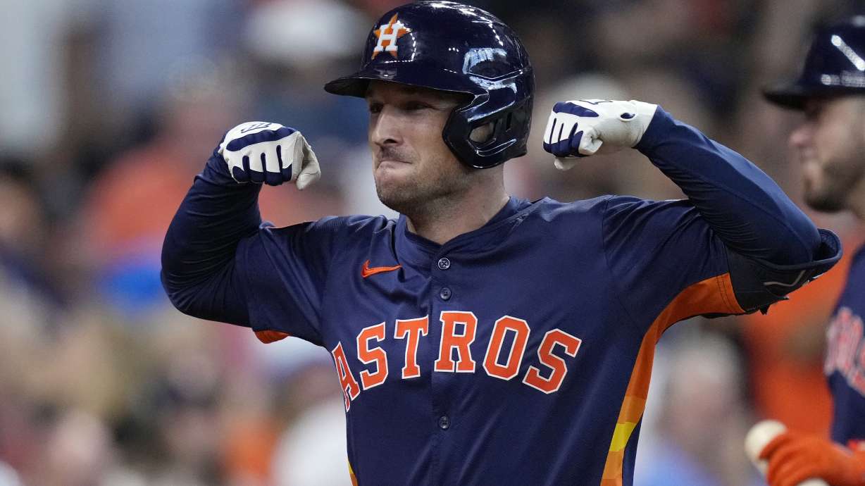 FILE - Houston Astros' Alex Bregman celebrates after hitting a two-run home run during the fifth inning of a baseball game against the Los Angeles Angels, Sunday, Sept. 22, 2024, in Houston.