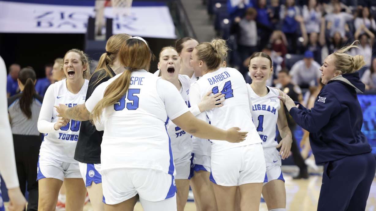 BYU women's basketball celebrates a 68-64 win over No. 20 Oklahoma State, Saturday, Feb. 15, 2025 at the Marriott Center in Provo, Utah.