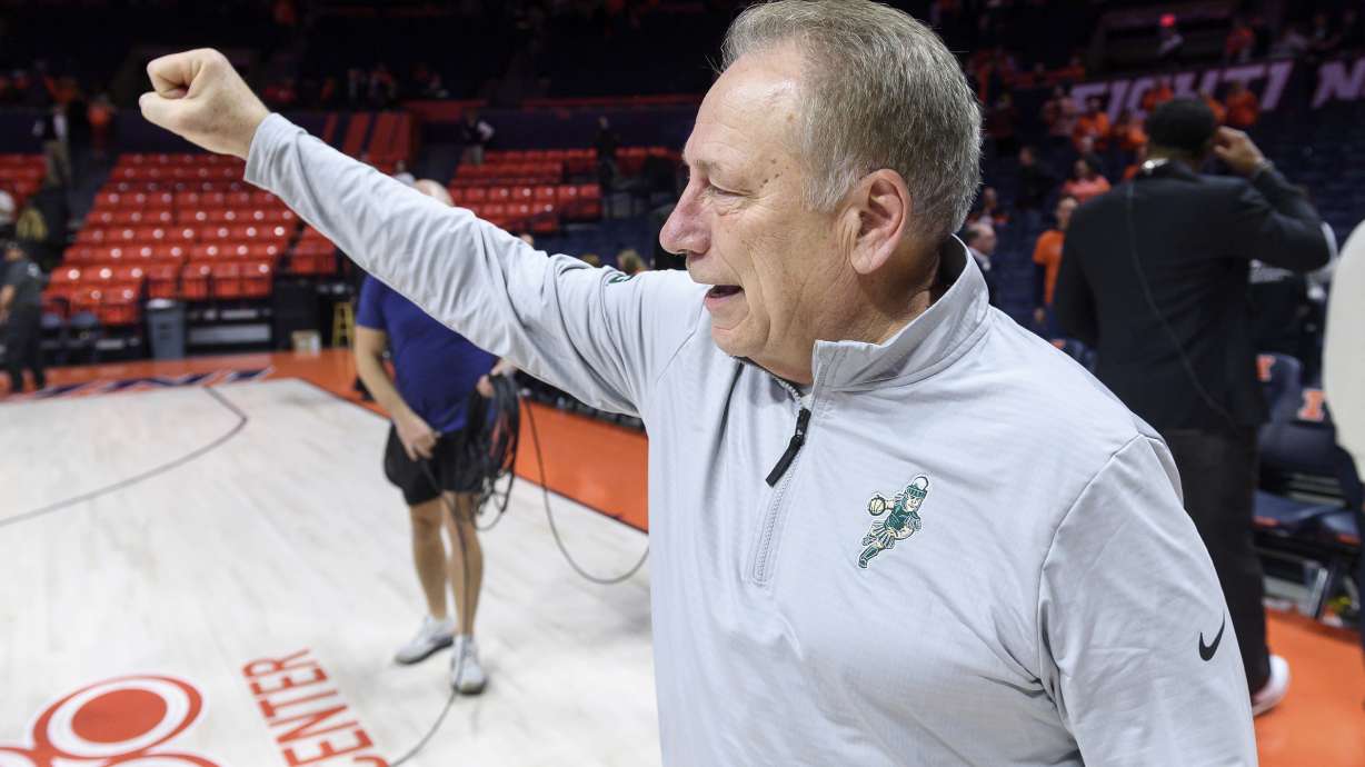 Michigan State Tom Izzo gestures to his fans after his record breaking win during an NCAA college basketball game against Illinois, Saturday, Feb. 15, 2025, in Champaign, Ill.