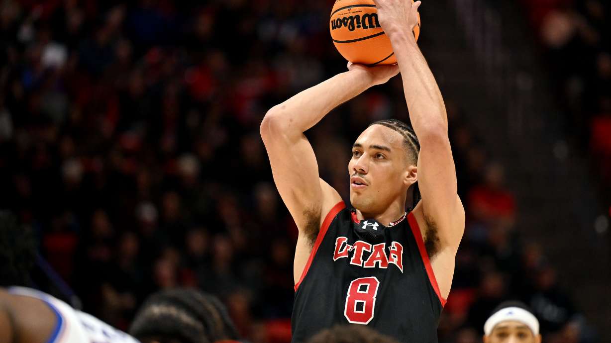 Utah Utes forward Keanu Dawes (8) puts up a free-throw as Utah and Kansas play in Salt Lake City, at the Huntsman Center on Saturday February 15, 2025.