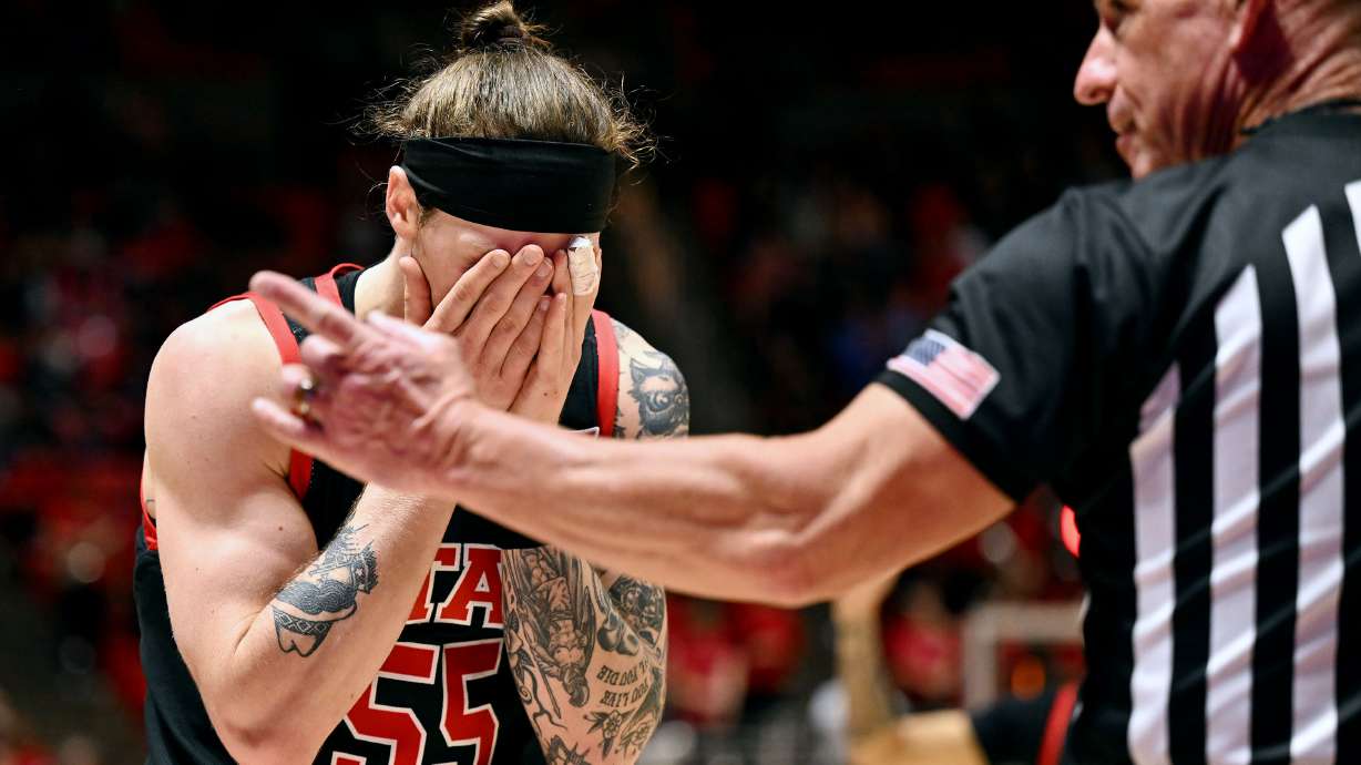 Utah Utes guard Gabe Madsen (55) reacts after being whistled for a foul as Utah and Kansas play in Salt Lake City, at the Huntsman Center on Saturday February 15, 2025. Utah won 74-67.