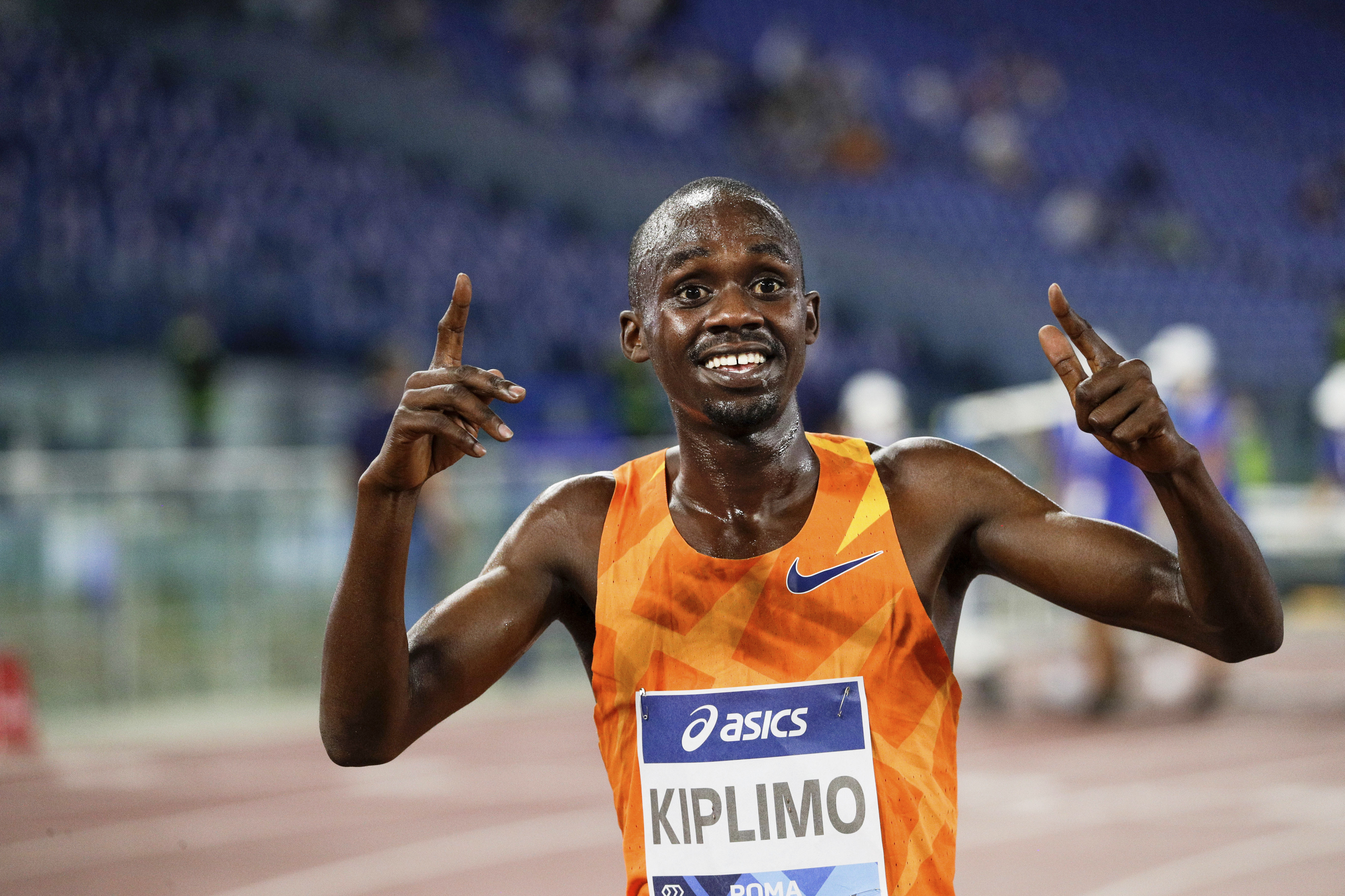 FILE - Uganda's Jacob Kiplimo celebrates his world record of 7 minutes and 26.64 seconds after winning the men's 3000m competition at the Golden Gala Pietro Mennea IAAF Diamond League athletics meet in Rome, Thursday, Sept. 17, 2020. 