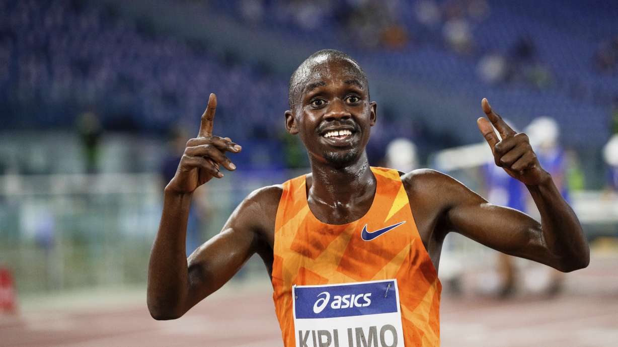 FILE - Uganda's Jacob Kiplimo celebrates his world record of 7 minutes and 26.64 seconds after winning the men's 3000m competition at the Golden Gala Pietro Mennea IAAF Diamond League athletics meet in Rome, Thursday, Sept. 17, 2020.