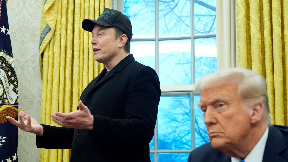 President Donald Trump listens as Elon Musk speaks in the Oval Office at the White House, Feb. 11, in Washington. The lightning speed with which Musk is operating has left many lawmakers scrambling to keep up.