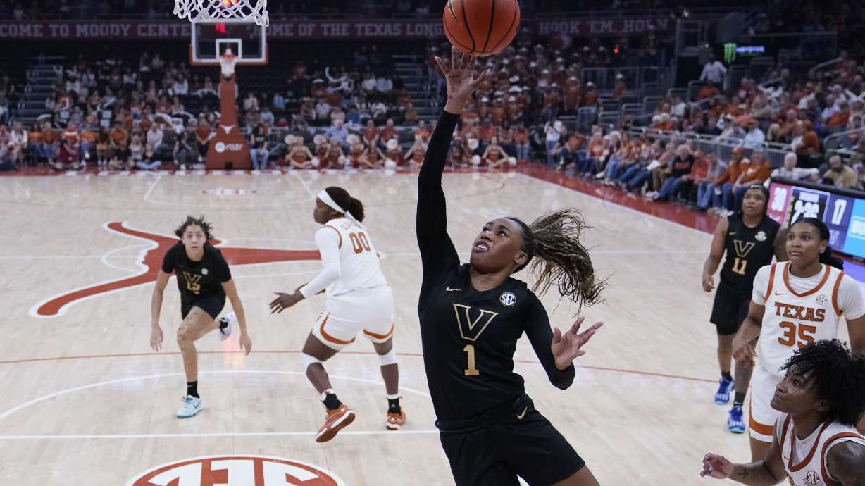 Vanderbilt guard Mikayla Blakes (1) scores against Texas during the first half of an NCAA college basketball game in Austin, Texas, Thursday, Feb. 6, 2025.