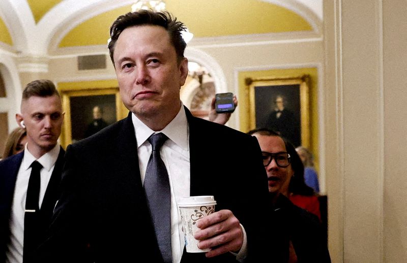 Elon Musk walks on Capitol Hill Dec. 5, 2024. A judge said on Monday she hoped to rule within 24 hours in a lawsuit that aims to protect information systems at major government agencies from Musk's DOGE team.