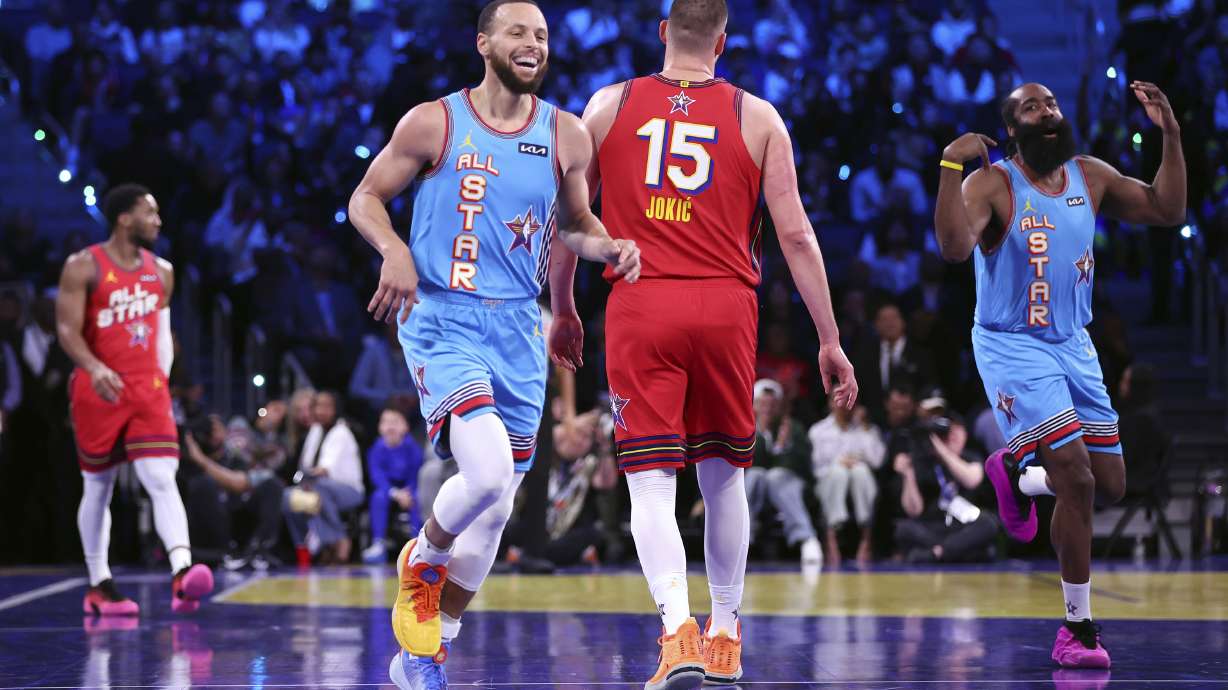 Team Shaq's Stephen Curry and James Harden react to a Curry three-pointer against Team Chuck in the championship game of the 74th NBA All-Star Game in San Francisco, Sunday, Feb. 16, 2025.