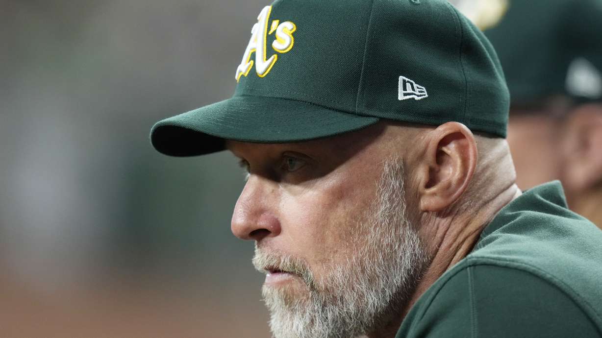 FILE - Oakland Athletics manager Mark Kotsay watches the action on the field during the ninth inning of a baseball game against the Arizona Diamondbacks, June 29, 2024, in Phoenix.