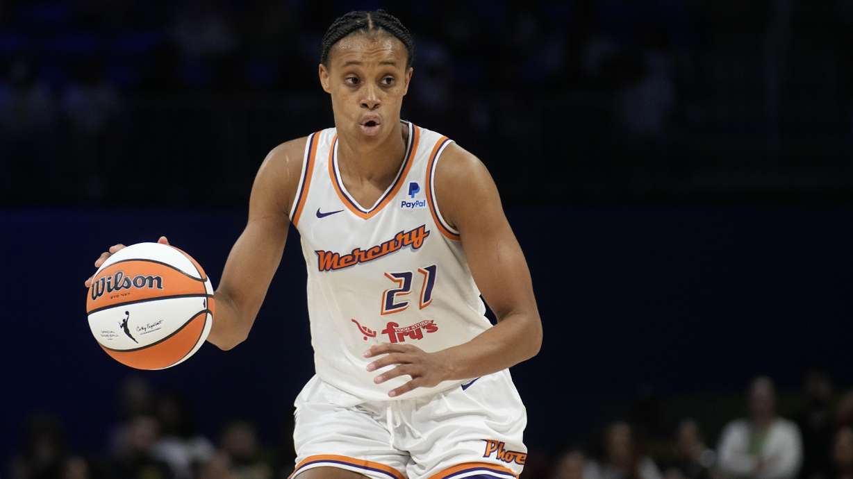 FILE - Phoenix Mercury forward Brianna Turner handles the ball during a WNBA basketball game against the Dallas Wings, June 7, 2023, in Arlington, Texas.