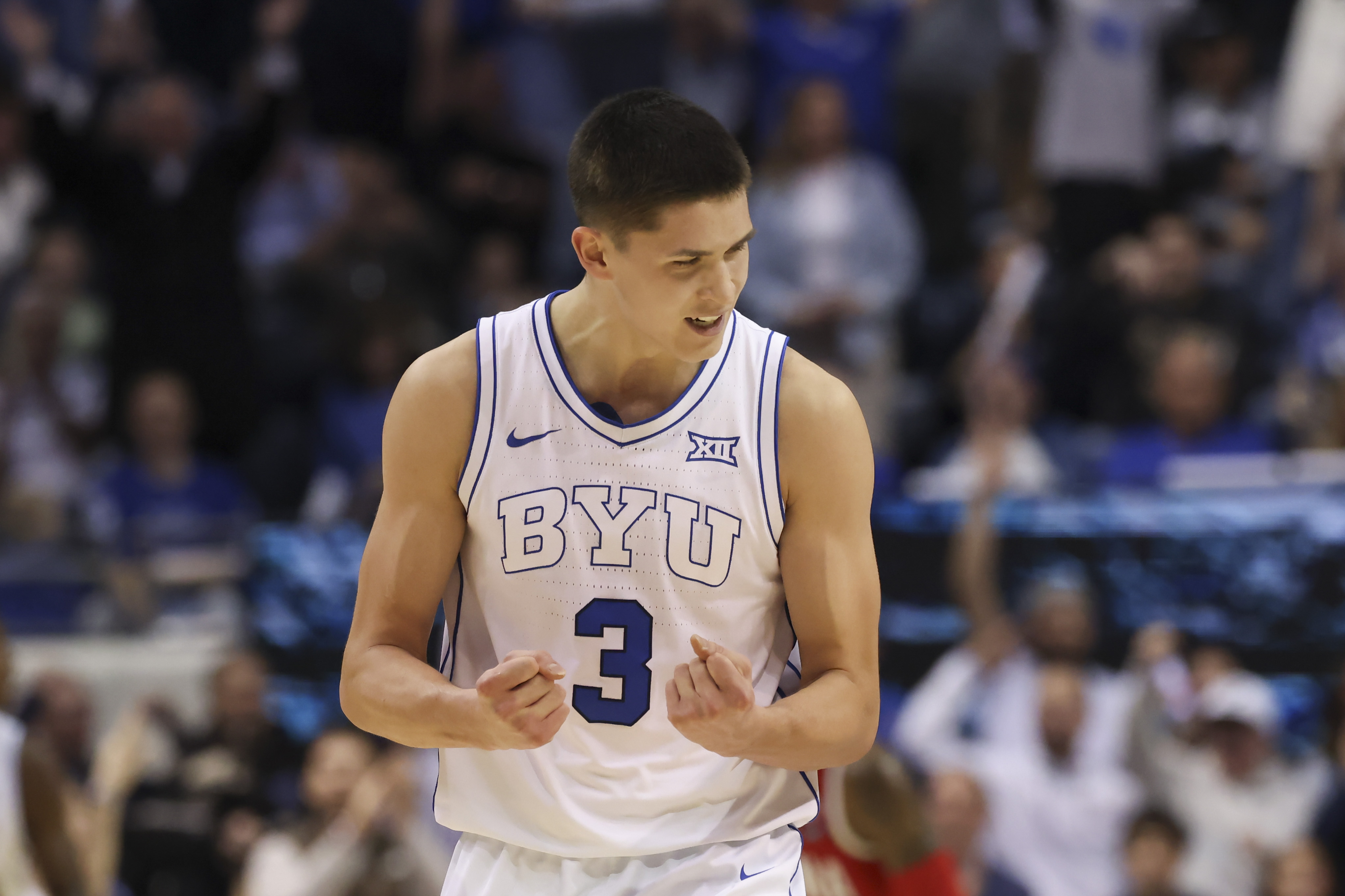 BYU guard Egor Demin (3) reacts to a play against Arizona during the second half of an NCAA college basketball game Tuesday, Feb. 4, 2025, in Provo, Utah.