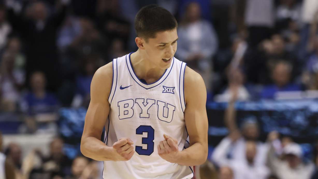 BYU guard Egor Demin (3) reacts to a play against Arizona during the second half of an NCAA college basketball game Tuesday, Feb. 4, 2025, in Provo, Utah.