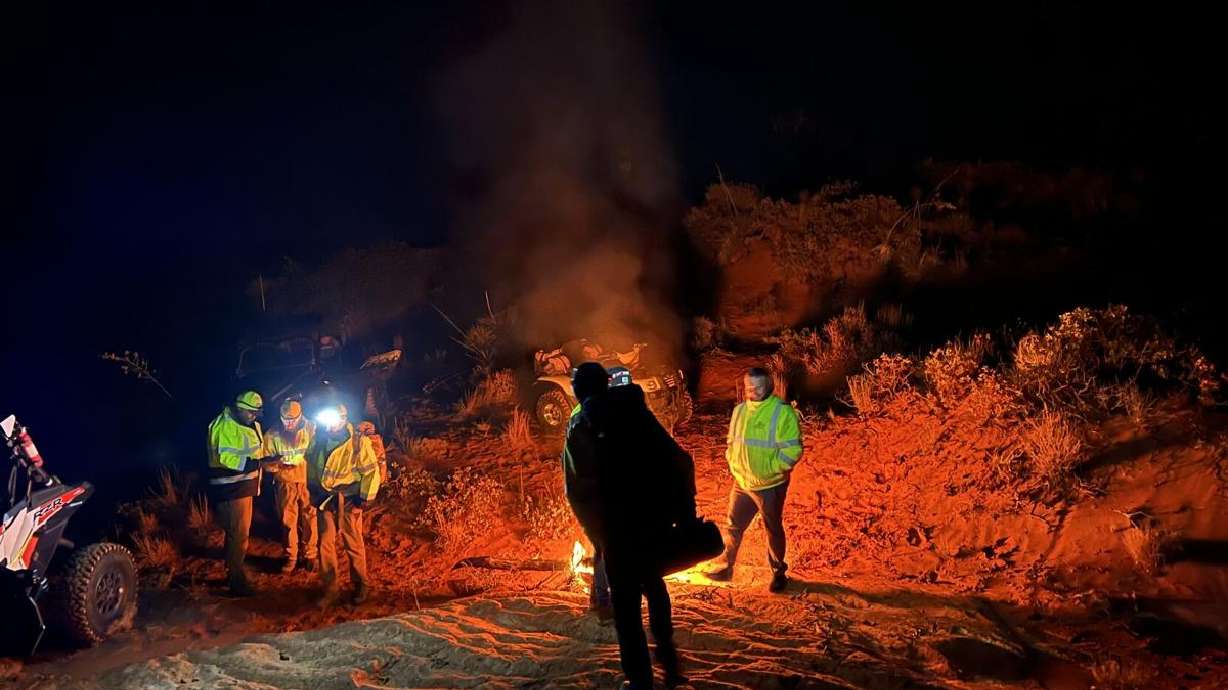 Washington County Sheriff Search and Rescue crews work to aid a father and son who were stranded overnight on Sunday, near Ivins.