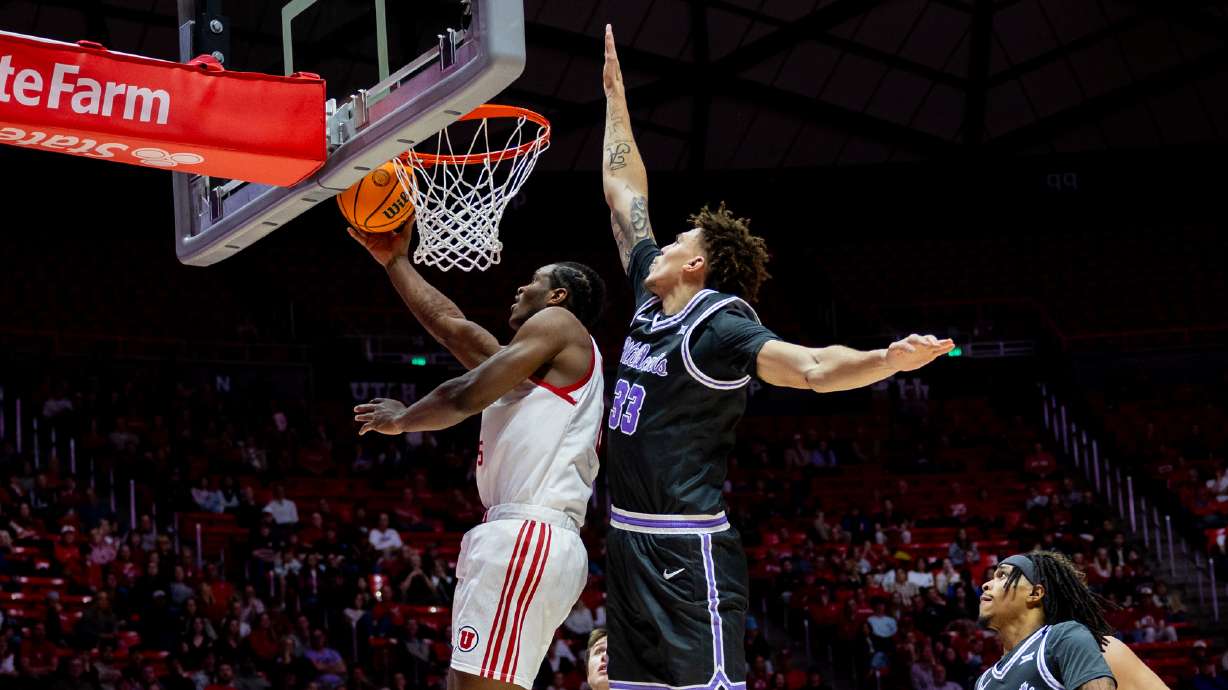 Utah Utes forward Ezra Ausar (2) goes up for a basket during a basketball game against the Kansas State Wildcats at Jon M. Huntsman Center in Salt Lake City on Monday, Feb. 17, 2025.
