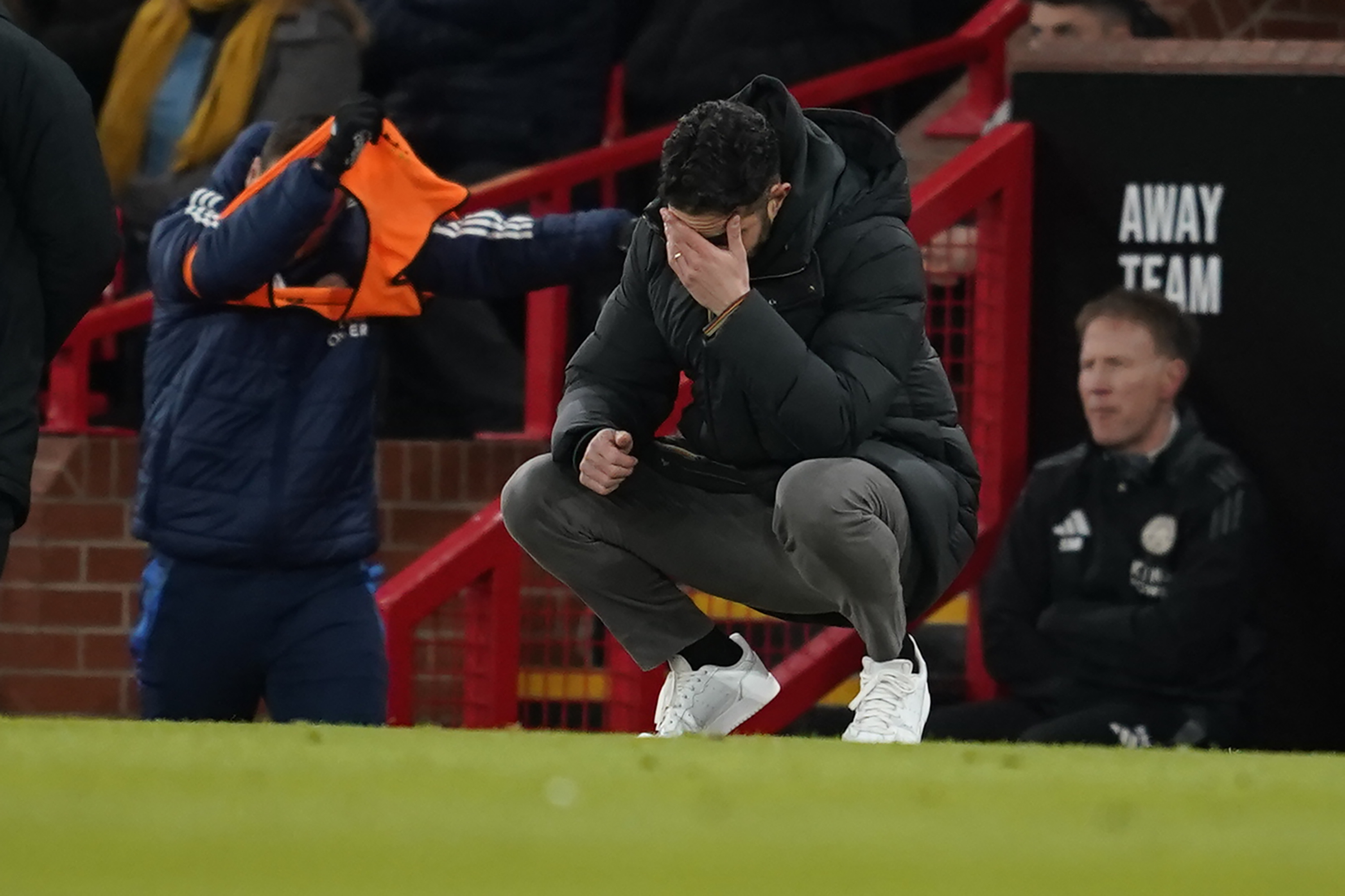 Manchester United's head coach Ruben Amorim reacts after Leicester's Bobby Decordova-Reid scored the opening goal during the English FA Cup fourth round soccer match between Manchester United and Leicester City at the Old Trafford stadium in Manchester, England, Friday, Feb. 7, 2025.