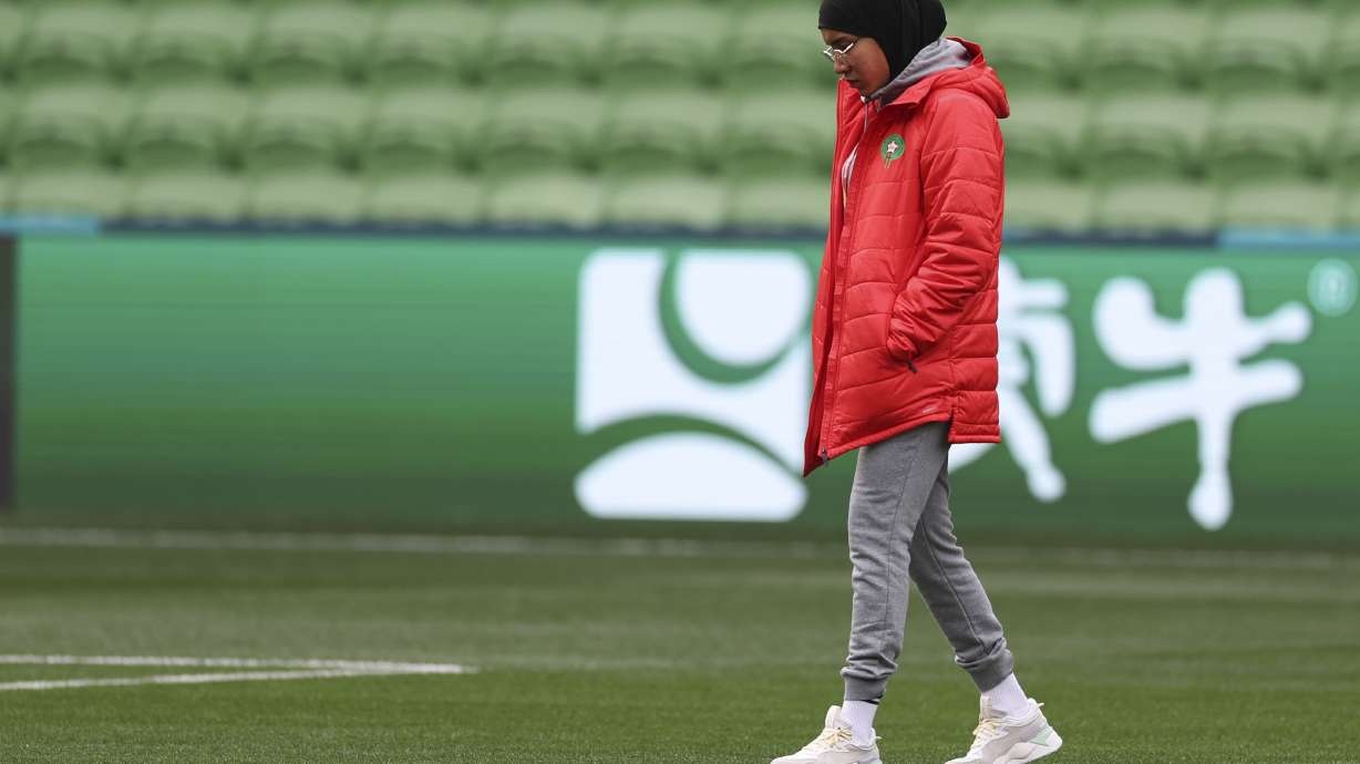 FILE - Morocco's Nouhaila Benzina walks around the ground during a familiarization tour ahead of her Women's World Cup Group H match with Germany in Melbourne, Australia, on July 23, 2023.