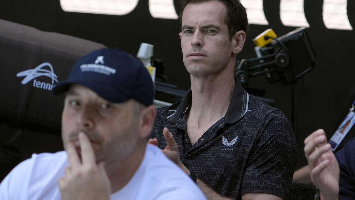Andy Murray, coach for Novak Djokovic of Serbia, watches his semifinal match against Alexander Zverev of Germany at the Australian Open tennis championship in Melbourne, Australia, Friday, Jan. 24, 2025.