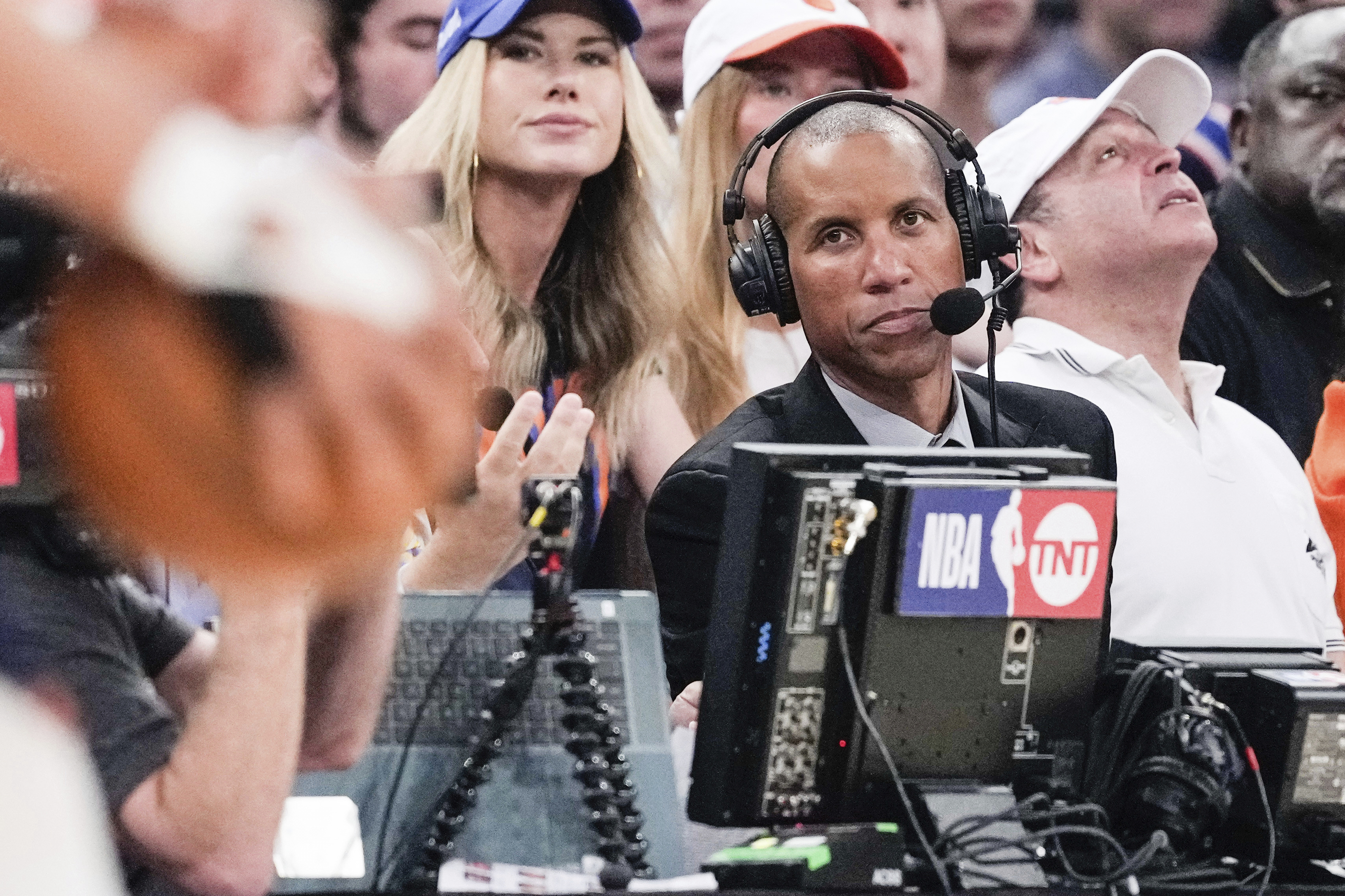 Broadcaster Reggie Miller works during the first half of Game 2 in an NBA basketball second-round playoff series between the New York Knicks and the Indiana Pacers, Wednesday, May 8, 2024, in New York.