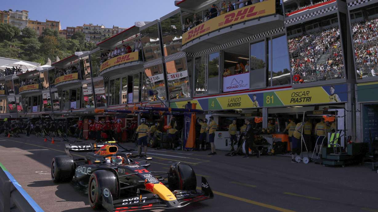 FILE - Red Bull driver Sergio Perez of Mexico steers his car on the pit lane during the qualifying session ahead of the Formula One Monaco Grand Prix at the Monaco racetrack, in Monaco, Saturday, May 25, 2024.