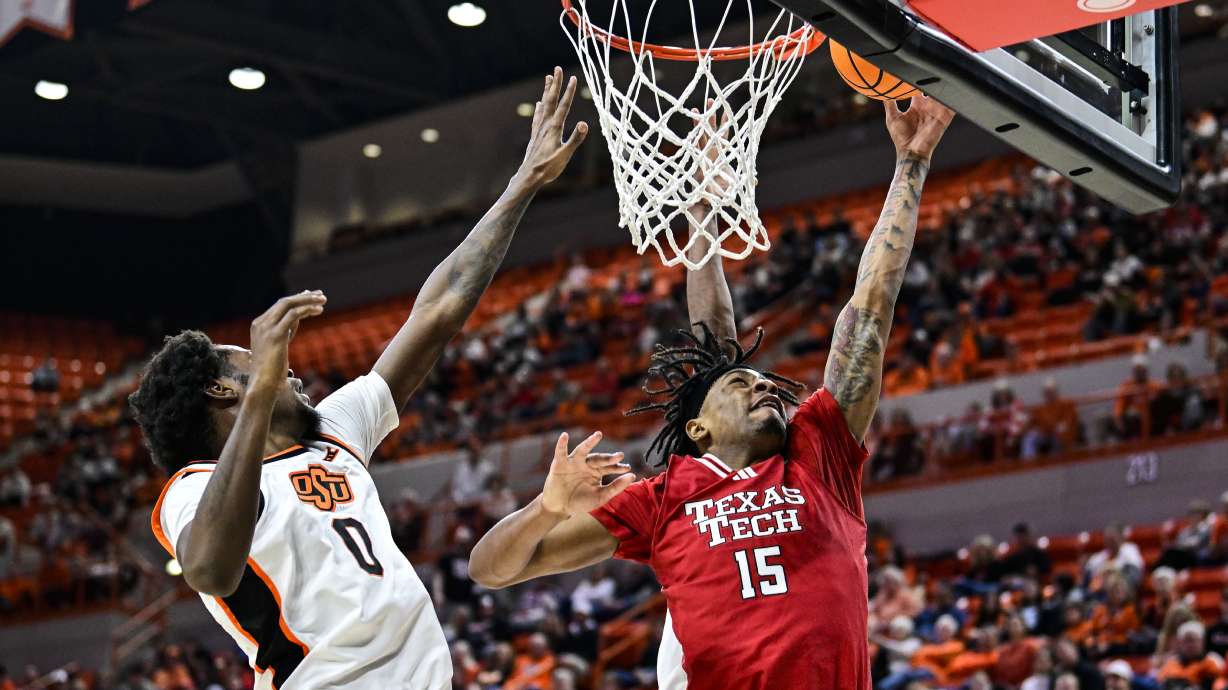 Texas Tech forward JT Toppin (15) shoots against Oklahoma State forward Marchelus Avery (0) during the first half of an NCAA college basketball game, Saturday, Feb. 15, 2025, in Stillwater, Okla.