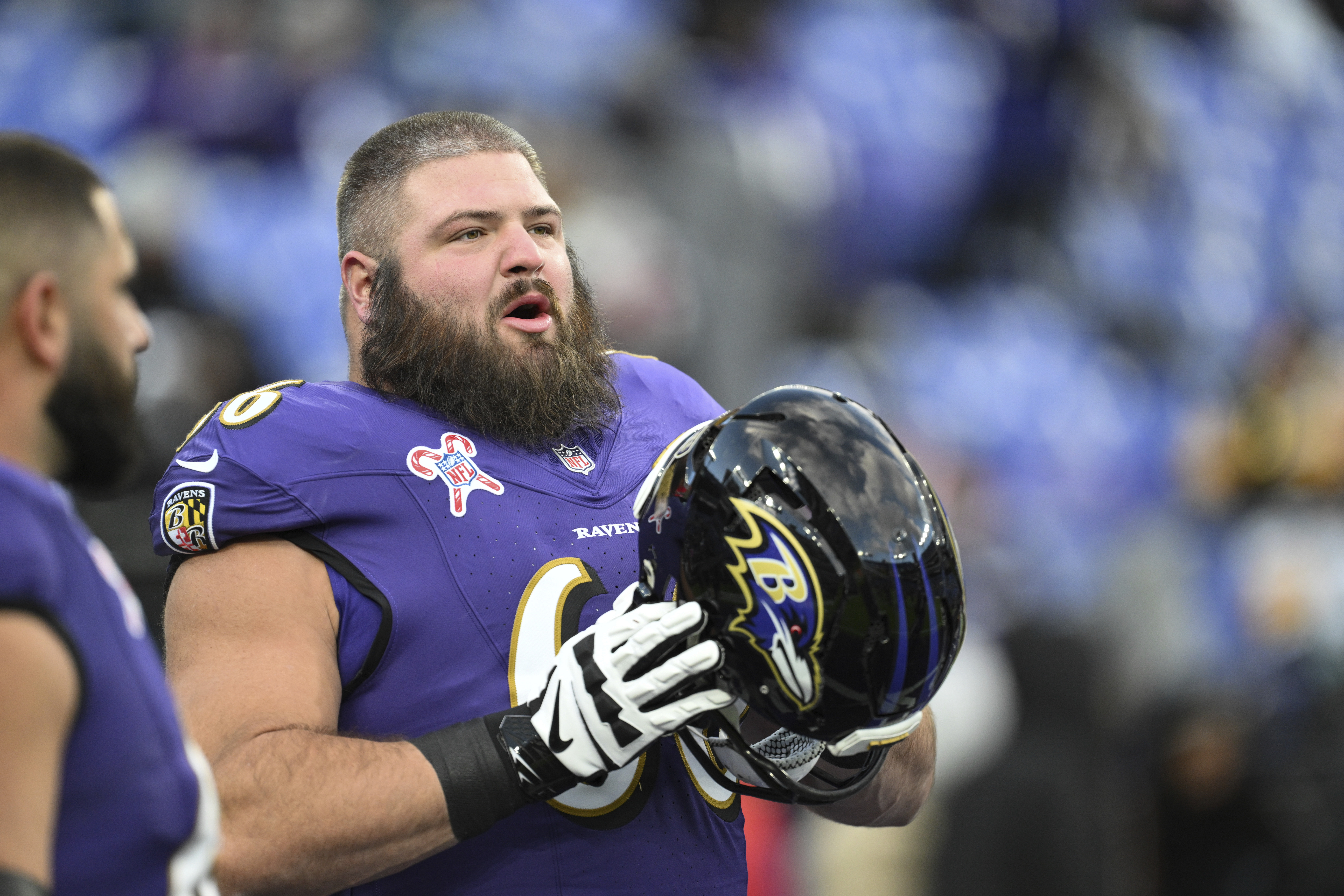 FILE - Baltimore Ravens guard Ben Cleveland looks on during pre-game warm-ups before an NFL football game against the Pittsburgh Steelers, Dec. 21, 2024, in Baltimore.