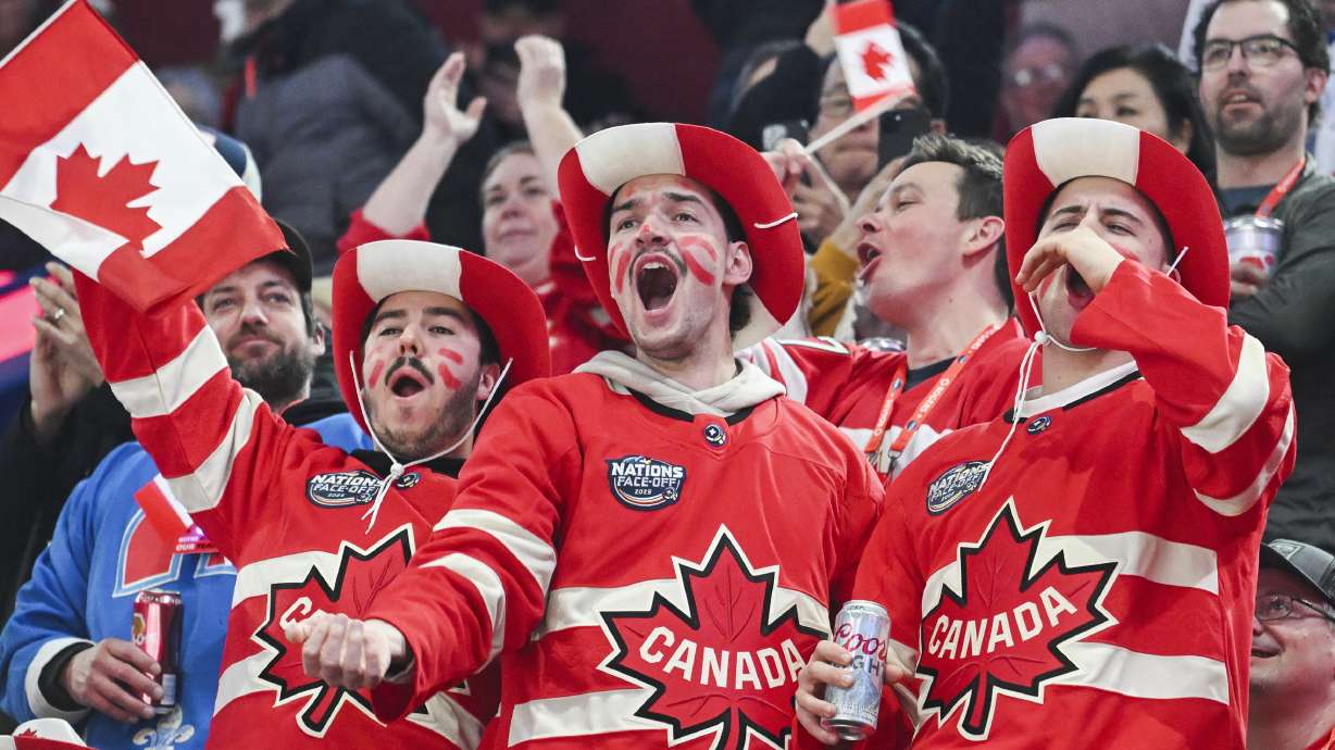 Canada fans cheer their team as they take to the ice ahead of their 4 Nations Face-Off hockey game against the United States in Montreal, Saturday, Feb. 15, 2025, in Montreal.