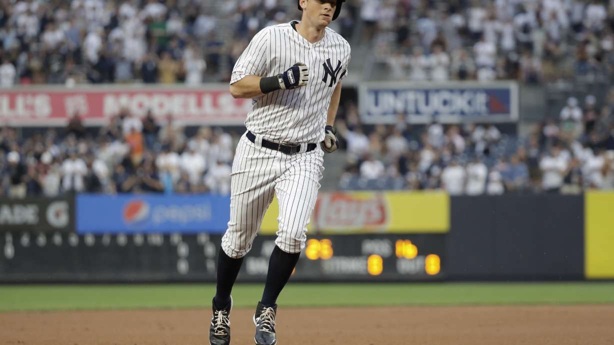 FILE - New York Yankees' DJ LeMahieu runs the bases after hitting a home run during the first inning of a baseball game against the Baltimore Orioles, in New York, Aug. 13, 2019.