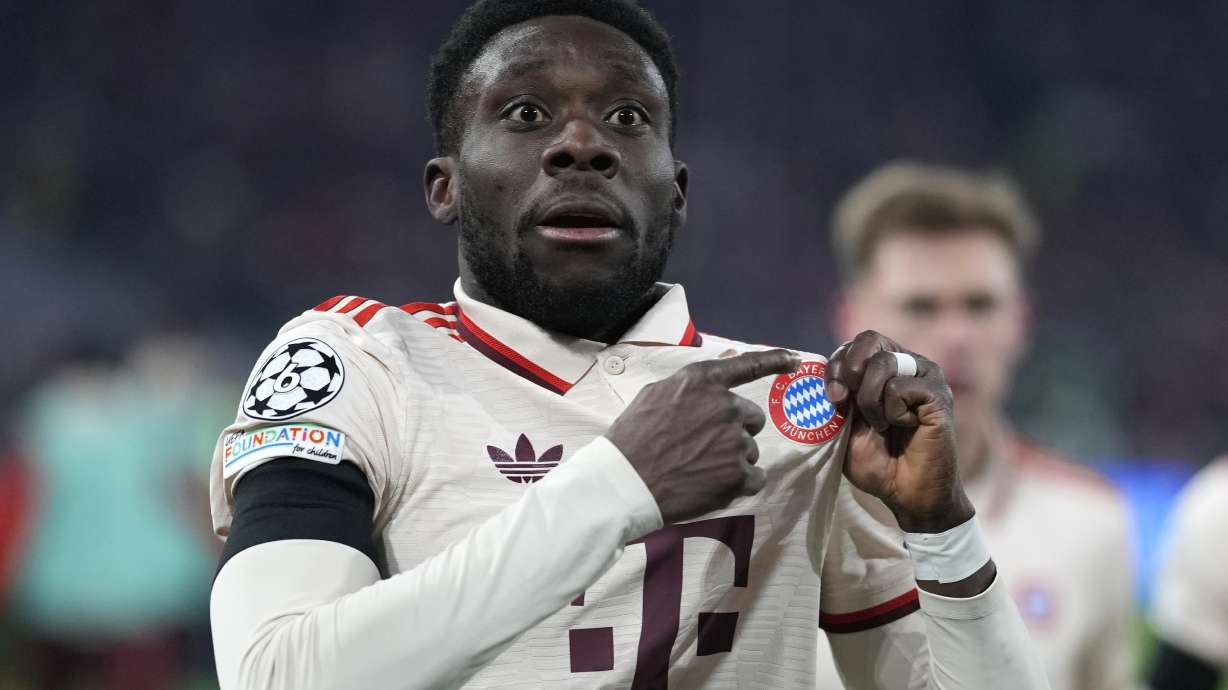 Bayern's Alphonso Davies celebrates after scoring his side's opening goal during the Champions League playoff second leg soccer match between FC Bayern Munich and Celtic Glasgow at the Allianz Arena in Munich, Germany, Tuesday, Feb. 18, 2025.