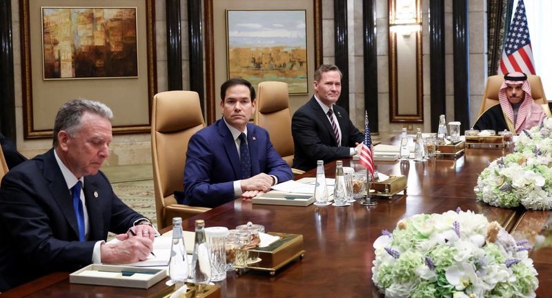Secretary of State Marco Rubio sits next to Mike Waltz and Steve Witkoff during a meeting with Saudi Foreign Minister Prince Faisal bin Farhan Al Saud, Mosaad bin Mohammad Al-Aiban, Sergei Lavrov and Russian President Vladimir Putin's foreign policy adviser Yuri Ushakov, at Diriyah Palace, in Riyadh, Saudi Arabia, Tuesday.
