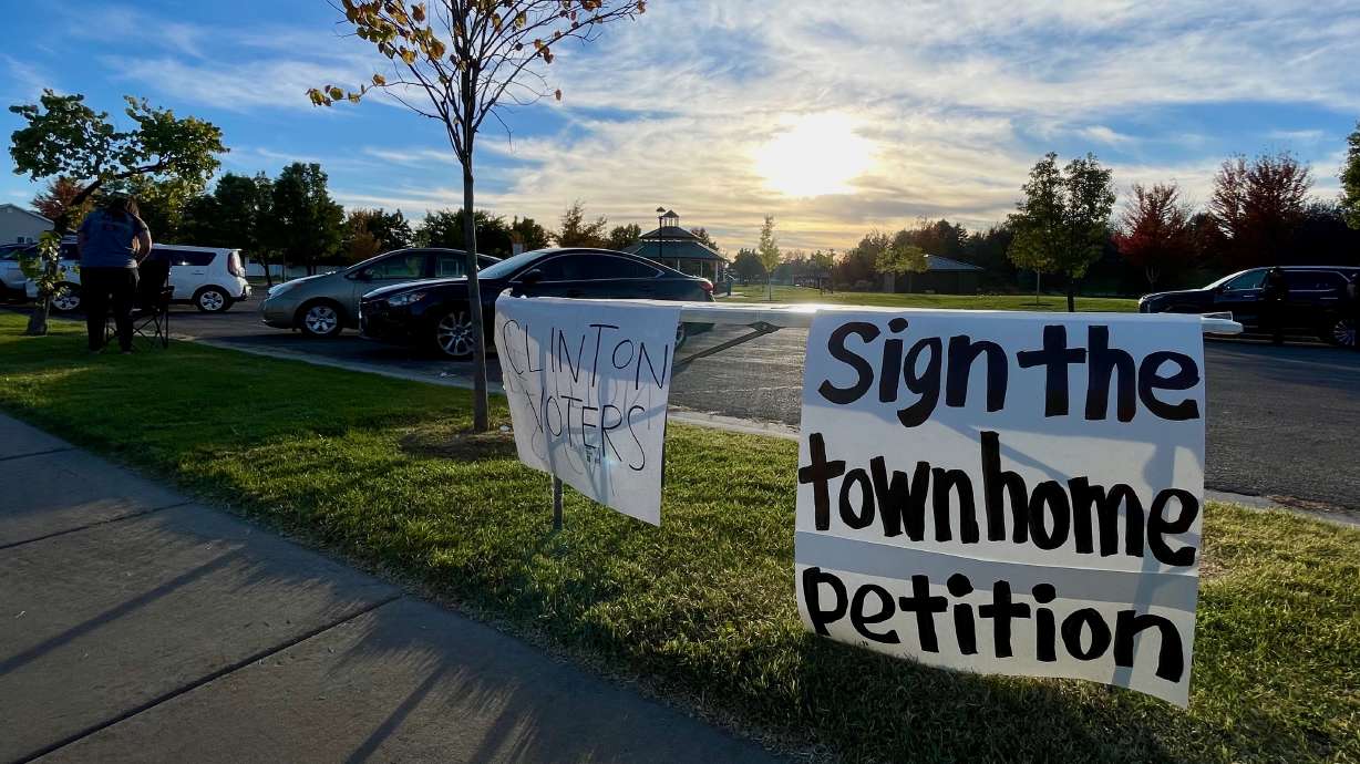 Weber County officials are probing efforts to halt a petition drive that had targeted a Clinton housing project. The Oct. 22, 2024, photo shows a sign at one of the petition drive signature-gathering efforts at Heritage Park in Clinton.