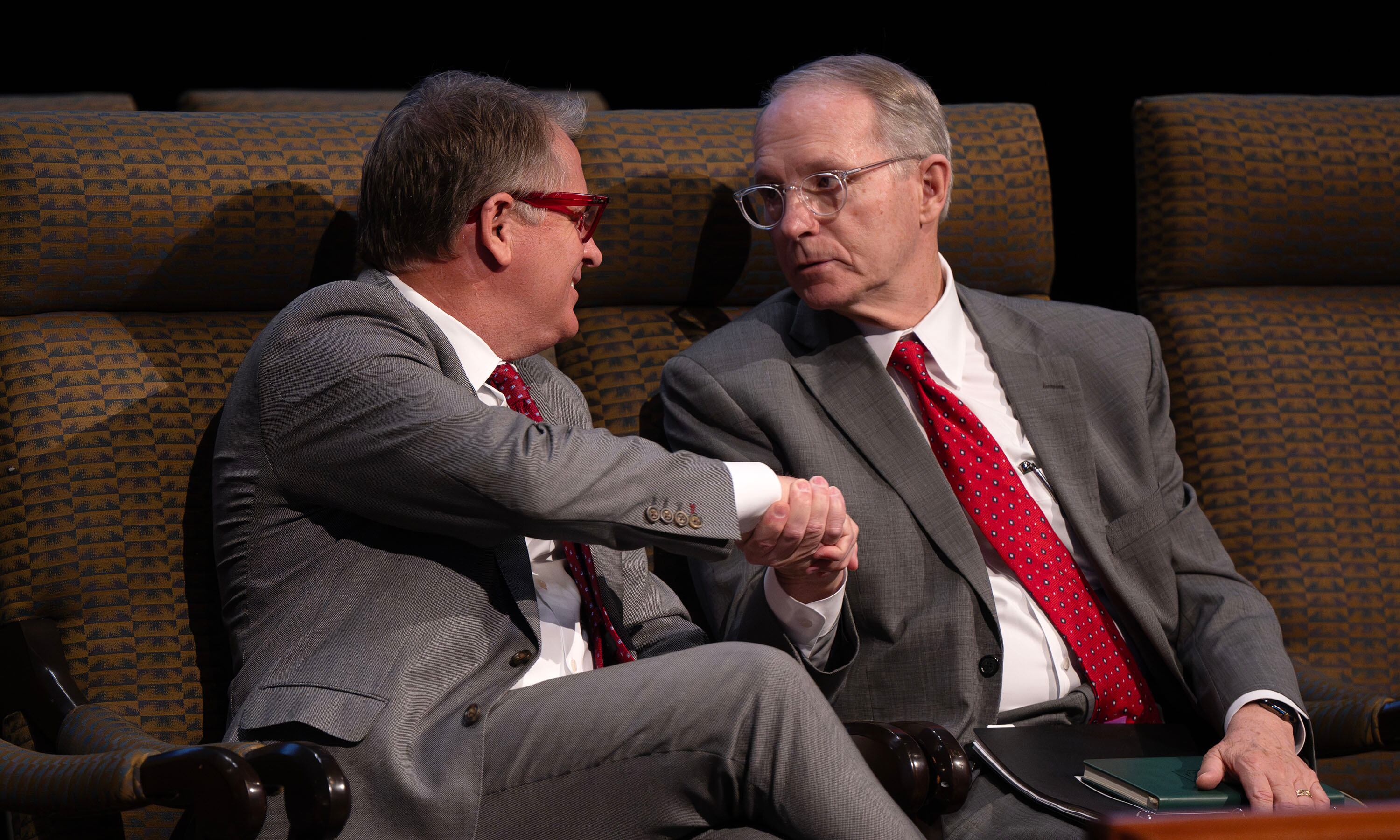 At the conclusion of the devotional, University of Utah President Taylor Randall, and Ensign College President Bruce C. Kusch shake hands after Randall spoke at the Ensign College weekly devotional at the Conference Center theater in Salt Lake City on Tuesday.