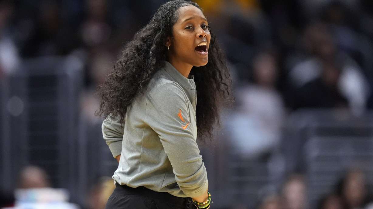 Seattle Storm head coach Noelle Quinn yells to her team during the first half of a WNBA basketball game against the Los Angeles Sparks, Wednesday, Sept. 11, 2024, in Los Angeles.