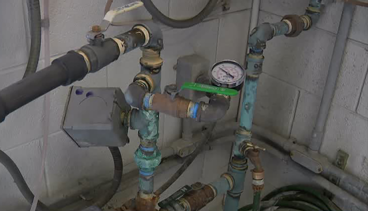 Lead distribution operator, Paul Spens of the Weber Basin Water Conservancy District says a fluoride additive and the gas that comes off it can corrode pipes and machinery, shown here in Layton on Tuesday.