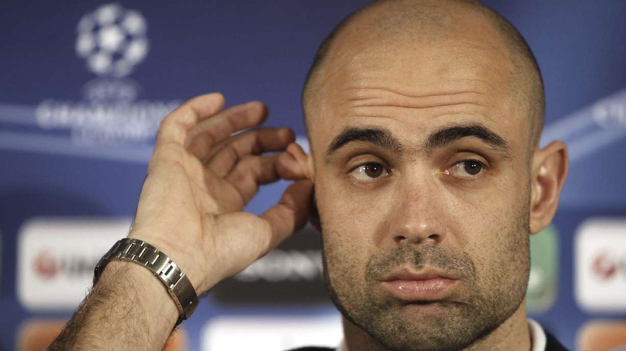 FILE - Lyon's Cris looks on during a press conference in Lyon, central France, Monday, Feb. 21, 2011.