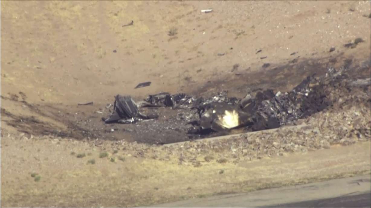 In this image taken from video, plane debris seen from above at Marana Regional Airport after a deadly crash in Marana, Ariz. on Wednesday.