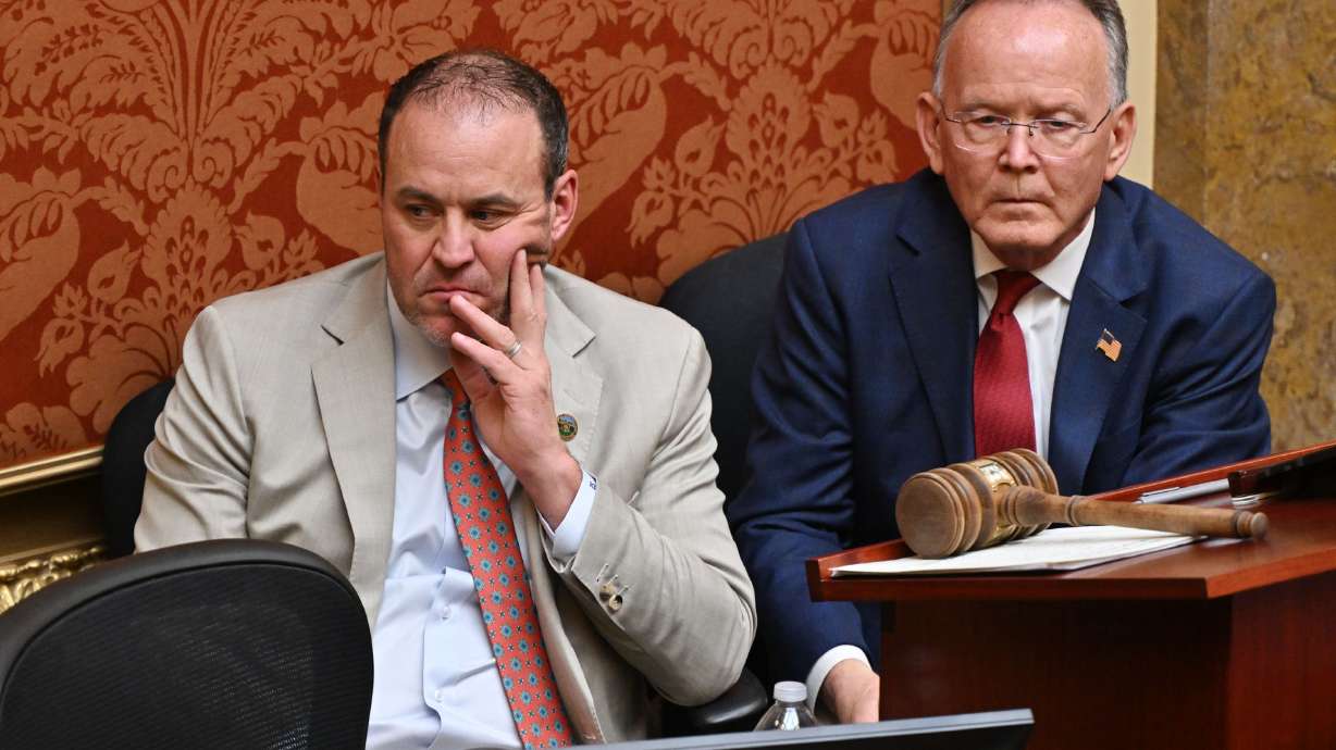 House Speaker Mike Schultz, R-Hooper and Senate President Stuart Adams listen inside the House of Representatives at the Capitol in Salt Lake City on Jan. 21. Utah's estimated tax revenues came in lower than previously projected Wednesday.