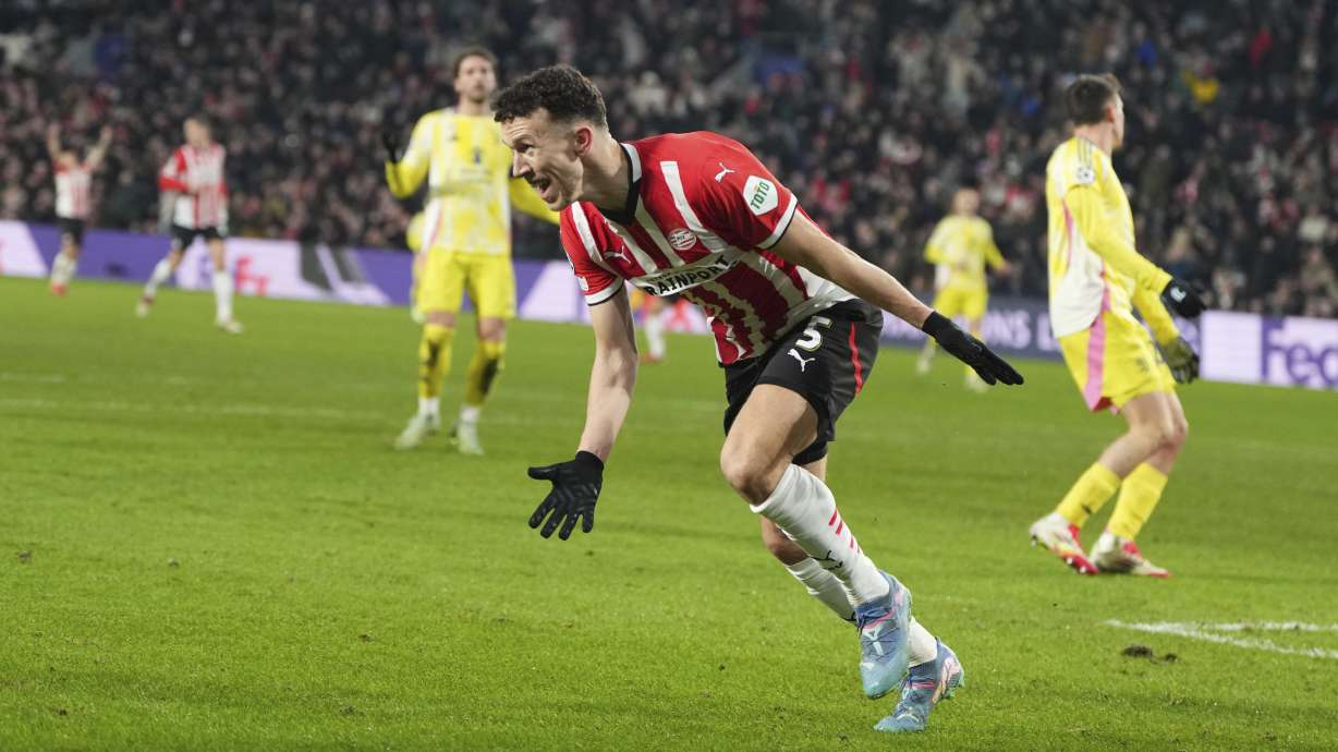 PSV's Ivan Perisic celebrates after scoring his side's opening goal during the Champions League playoff second leg soccer match between PSV and Juventus at Phillips Stadium in Eindhoven, Netherlands, Wednesday, Feb.19, 2025.