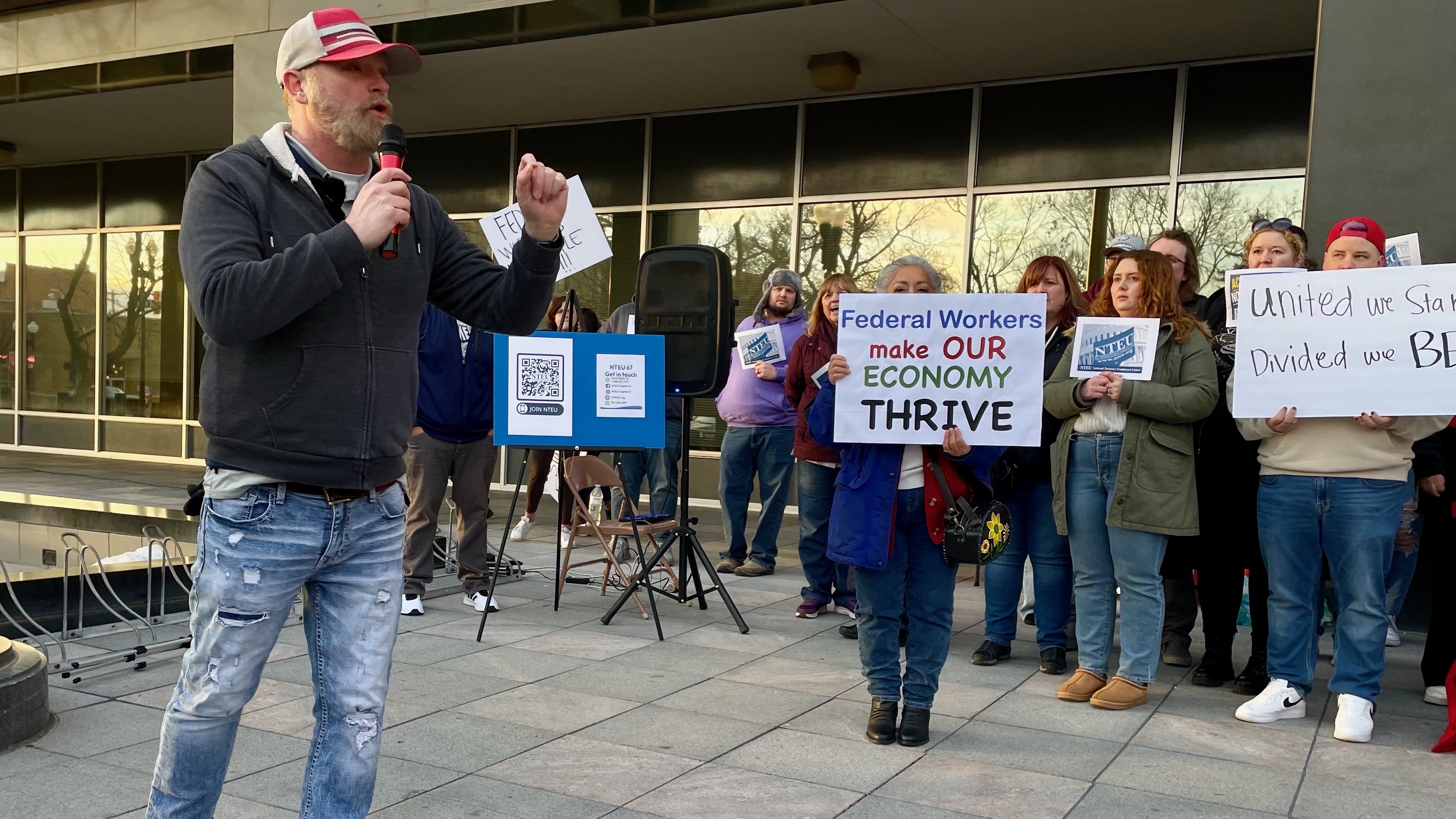 Robert Lawrence of Chapter 67 of the National Treasury Employees Union speaks at a demonstration against firings of IRS workers in Ogden on Wednesday.