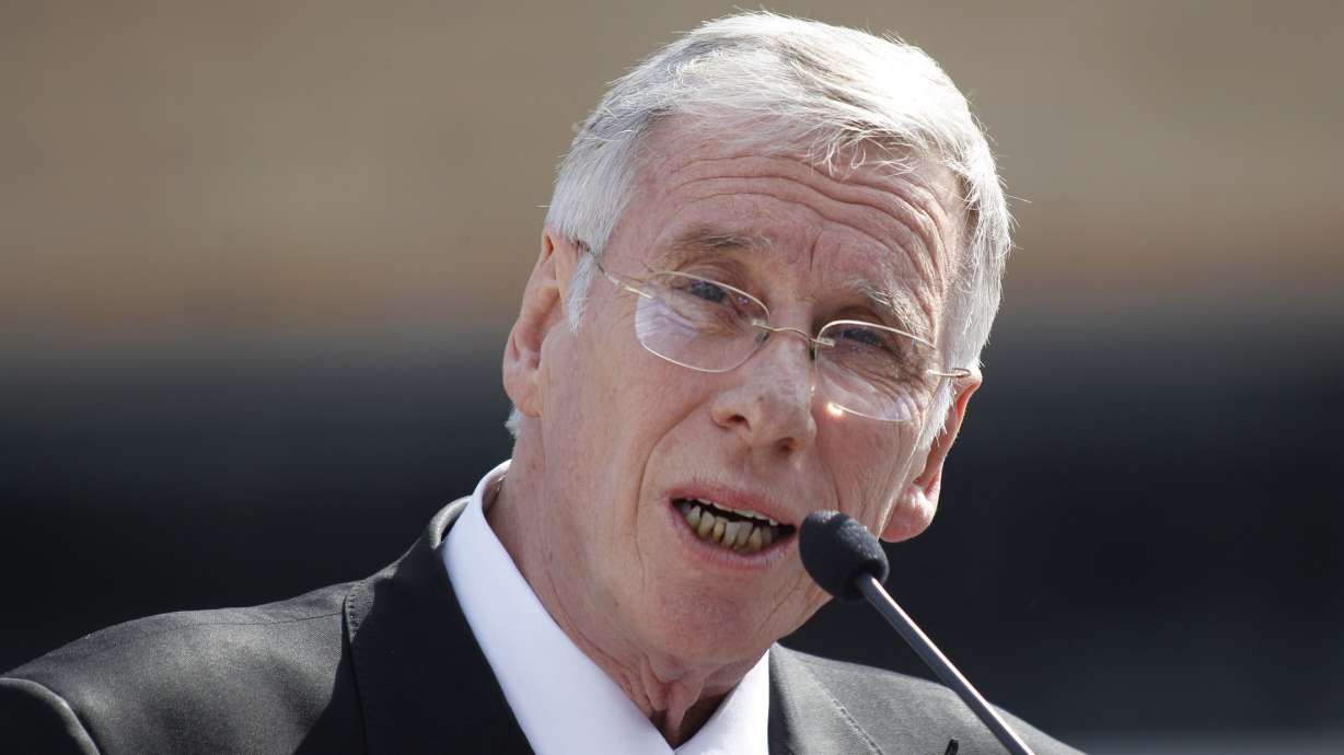 FILE - Pittsburgh Penguins long time broadcaster Mike Lange addresses the crowd before the unveiling of a statue depicting Pittsburgh Penguins Hall of Fame center Mario Lemieux outside the NHL hockey team's arena March 7, 2012, in Pittsburgh.
