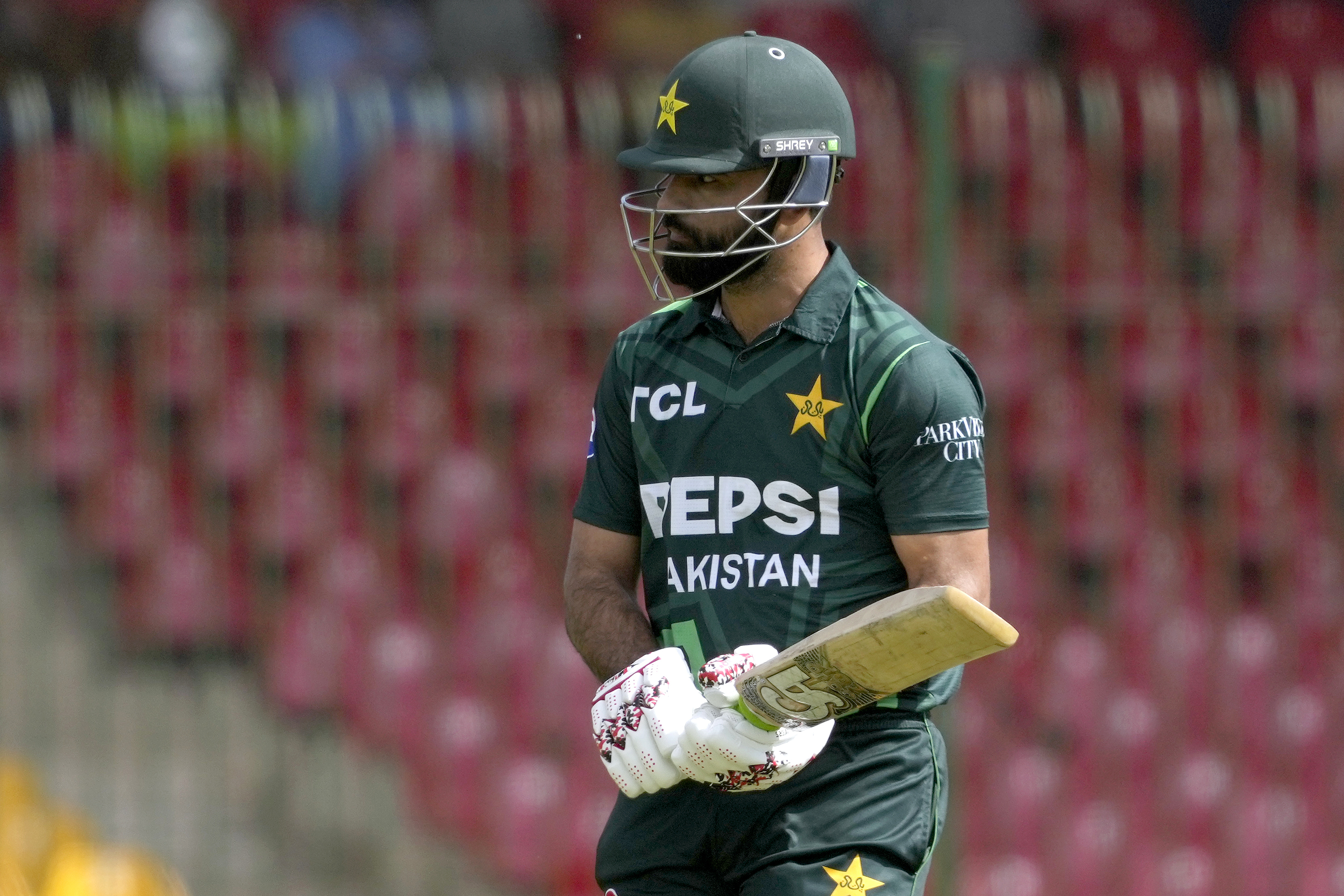 Pakistan's Fakhar Zaman reacts as he walks off the field after his dismissal during the tri-series ODI cricket final match between Pakistan and New Zealand, in Karachi, Pakistan, Friday, Feb. 14, 2025. 