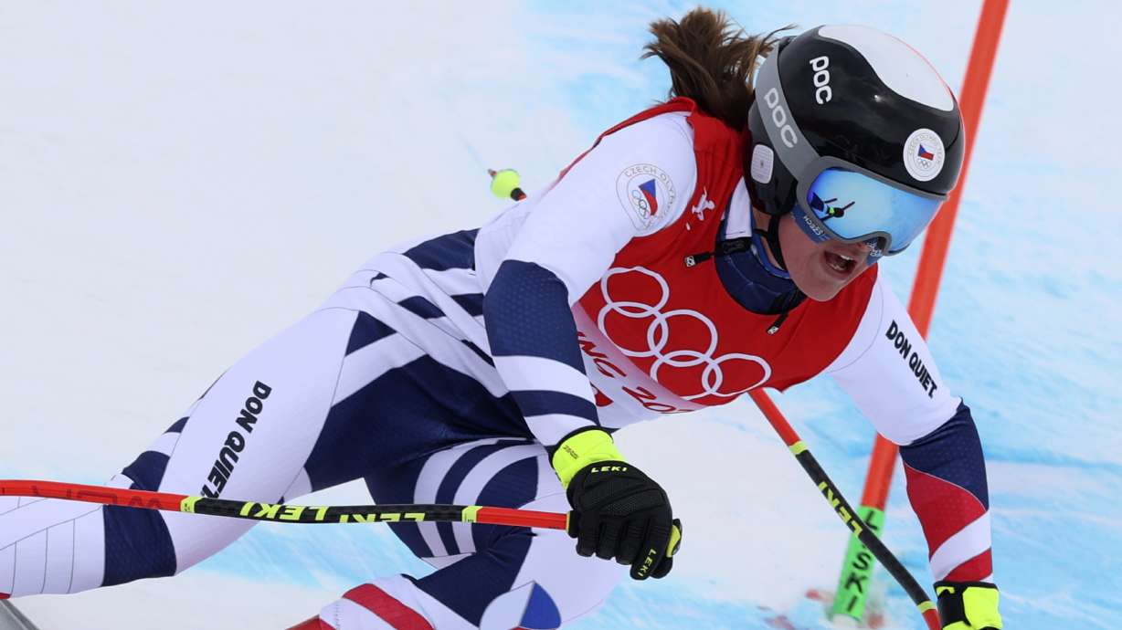FILE -Tereza Nova of Czech Republic makes a turn during the women's downhill at the 2022 Winter Olympics, Tuesday, Feb. 15, 2022, in the Yanqing district of Beijing.