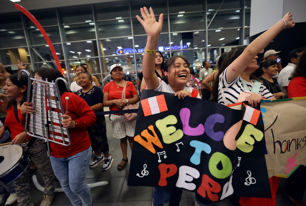 People welcome The Tabernacle Choir and Orchestra at Temple Square at the Jorge Chavez International Airport in Lima, Peru, as the choir and orchestra arrive for the “Songs of Hope” world tour on Tuesday.