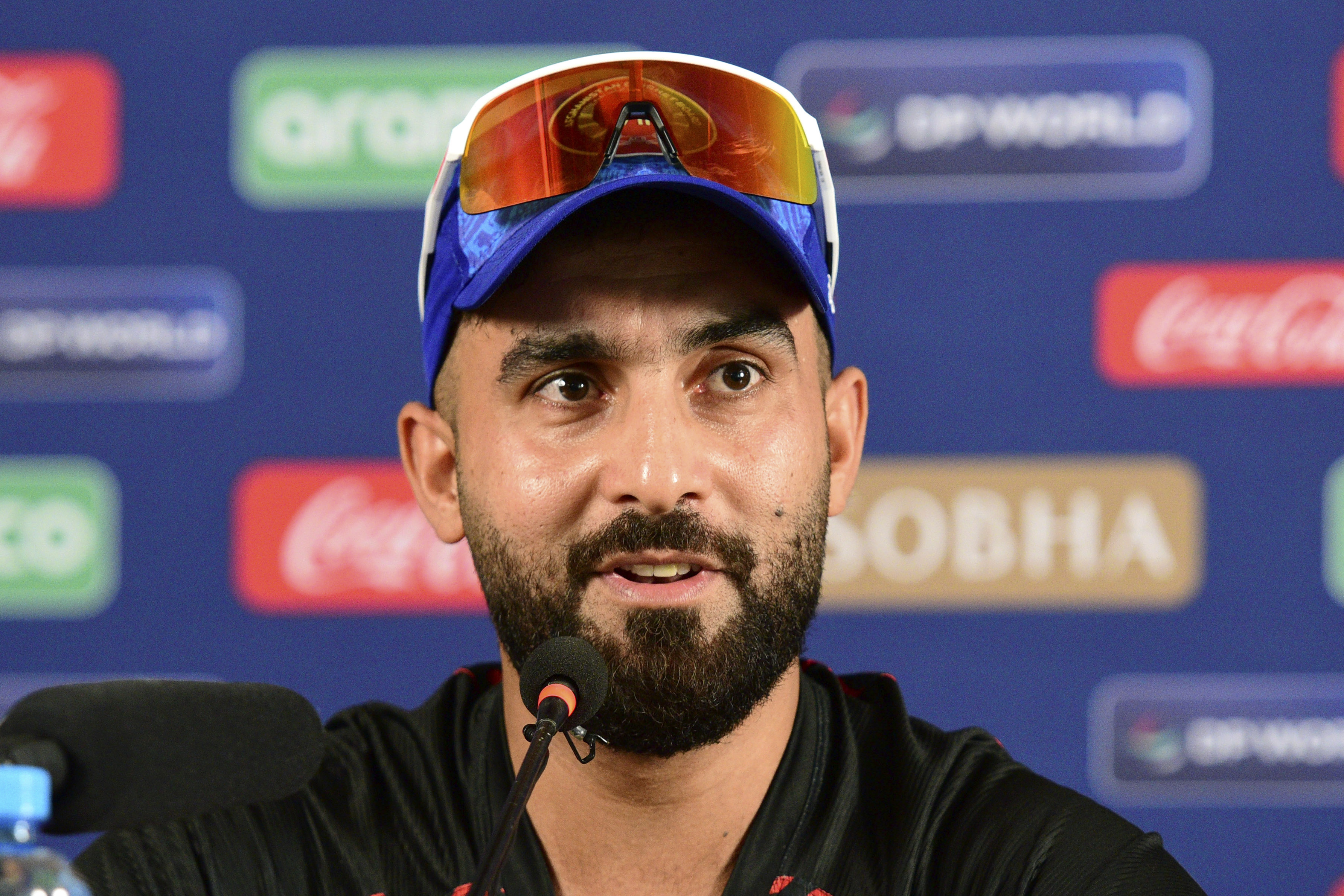 Afghanistan captain Hashmatullah Shahidi speaks during a press conference about their ICC Champions Trophy cricket match against South Africa, in Karachi, Pakistan Thursday, Feb. 20, 2025. 