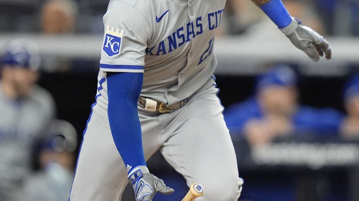 FILE - Kansas City Royals outfielder Tommy Pham (22) heads for first base on an RBI single against the New York Yankees during the fourth inning of Game 2 of the American League baseball playoff series, Oct. 7, 2024, in New York.