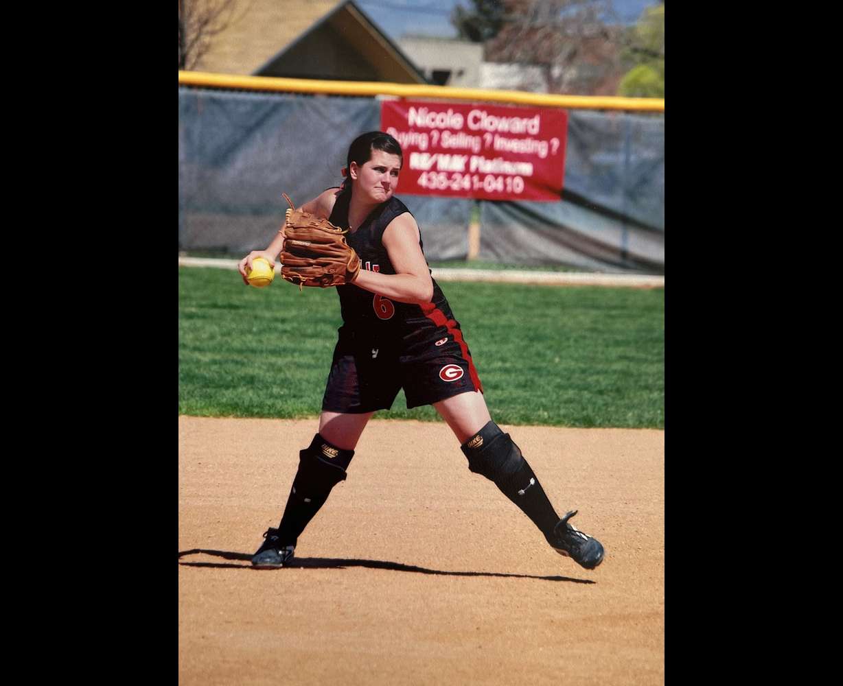 An undated photo of Korryn Coates playing softball for Grantsville High School, between 2008 and 2009. Coates says that a teacher and coach encouraged an inappropriate and illegal sexual relationship with her as a minor.